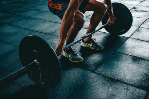 Person holding barbell