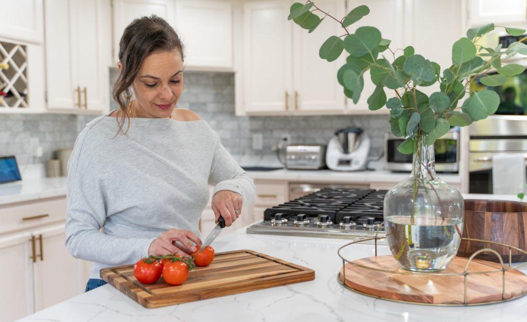 Dana Kay cutting salad
