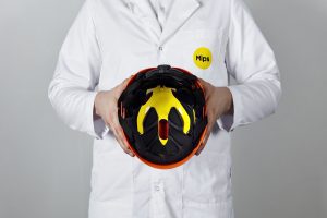 man holding helmet