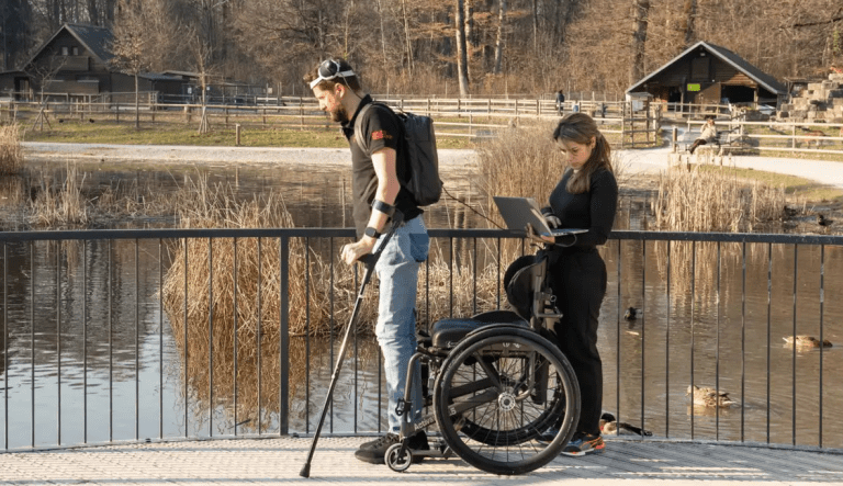 Neuroprosthetic technology helping a paraplegic man regain lower body control