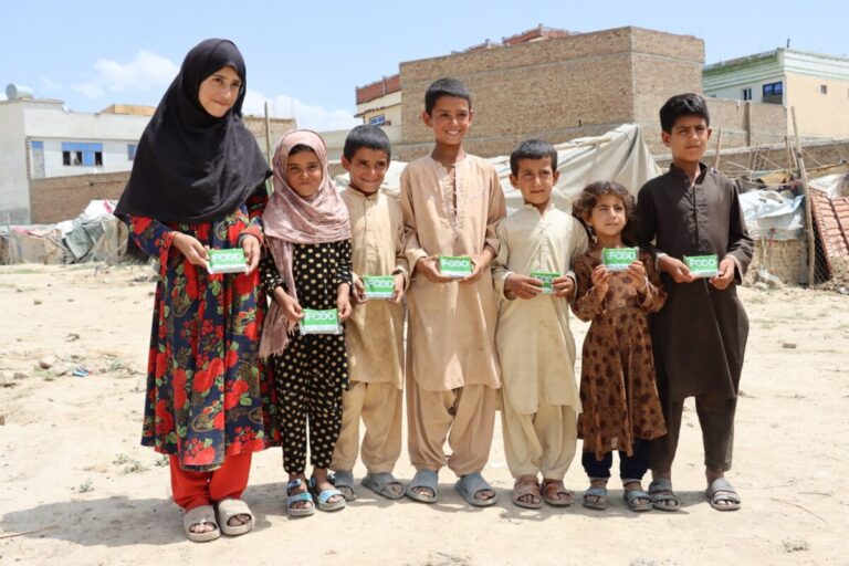 E2G-FOOD-bars-enjoyed-by-a-community-in-Kabul-Afghanistan.-Distribution-facilitated-by-our-Local-Partner-Gulzad-Group