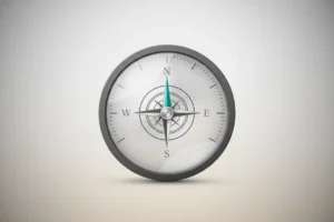 Minimalist gauge with a central compass rose, symbolizing company values guiding performance on a neutral background.